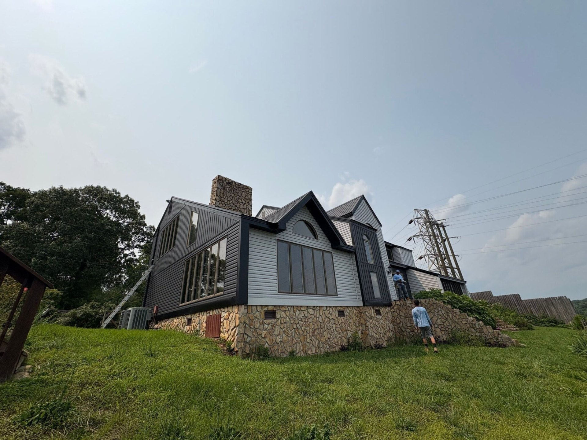 Siding + Metal Roof Remodel